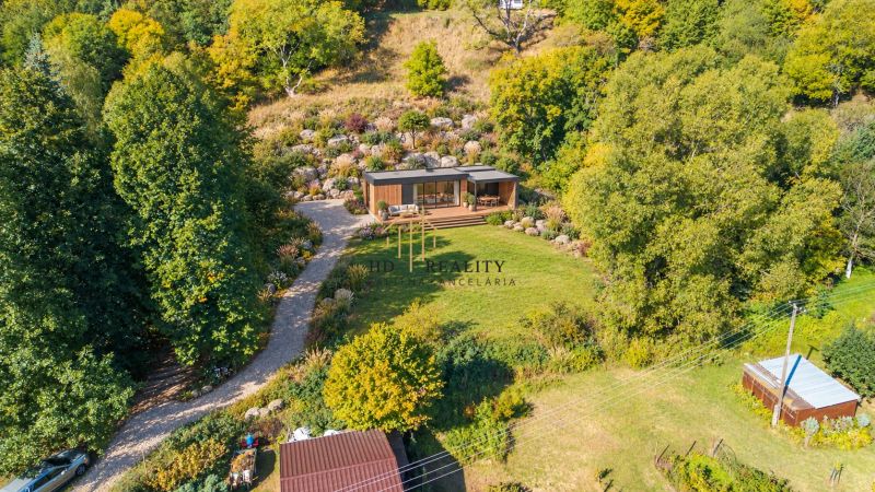 Recreational plots in Štiavnické Bane with a modern wooden structure and beautiful nature.