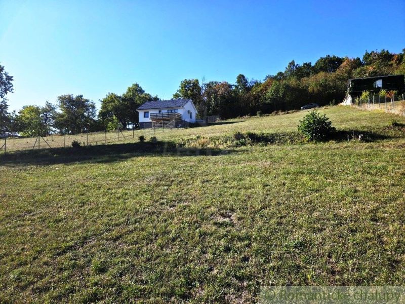 A small house on a gently sloping meadow in Záhrady near Krupina.