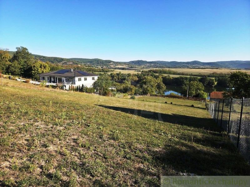 A house surrounded by nature and a spacious garden, overlooking the valley in the Krupina area.